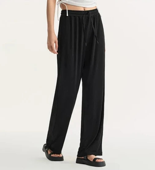 BLACK COMFORT FLEX WIDE-LEGGED TROUSERS mfoya